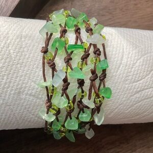 Pretty green bead brown cord bracelet